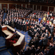 Democrats stand, Republicans sit, as Obama speaks in the 2010 SOTU.